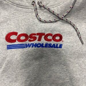 Kirkland Signature Gray Hoodie with Red and Blue Logo